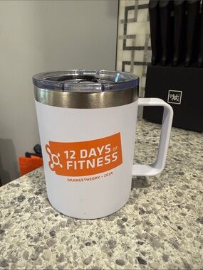 Orangetheory White and Orange 12 Days of Fitness Travel Mug with Handle